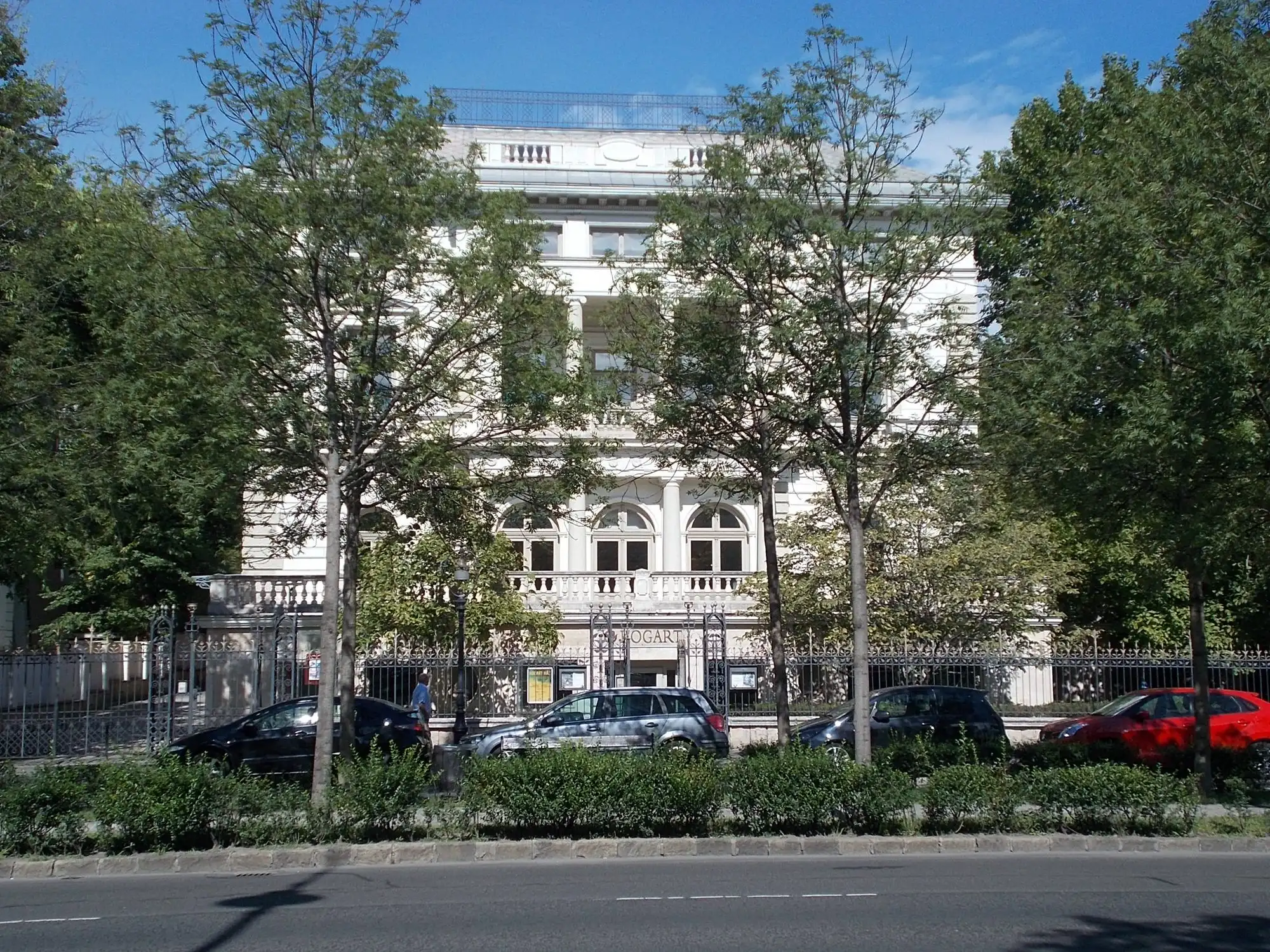 The villa section of Andrássy Avenue near Heroes' Square in Budapest, with a service road, trees and a house set back behind its front garden