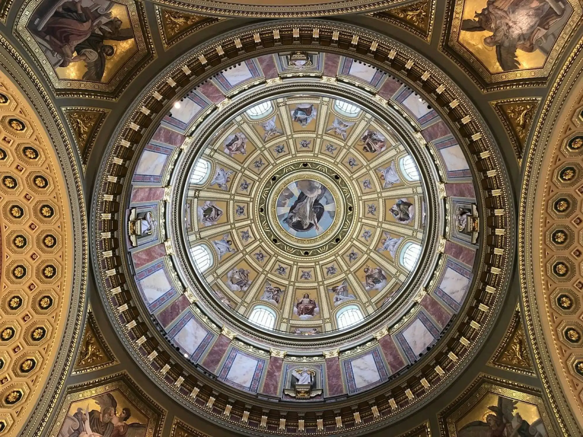 Looking straight up into the dome of St. Stephen's Basilica, with Károly Lotz's mosaic of God the Father at the centre