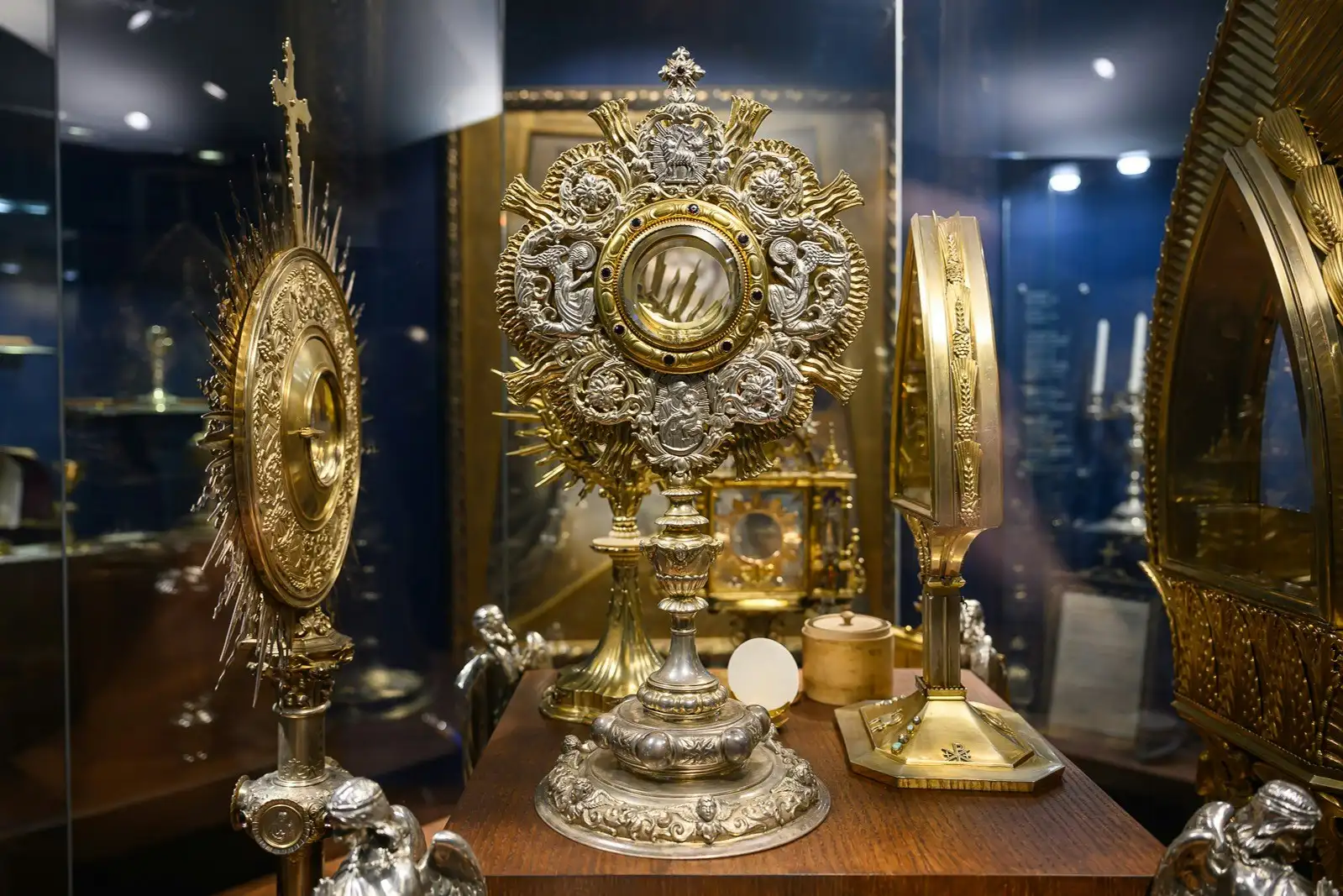 Gilded monstrances in a display case in the Treasury of St. Stephen's Basilica