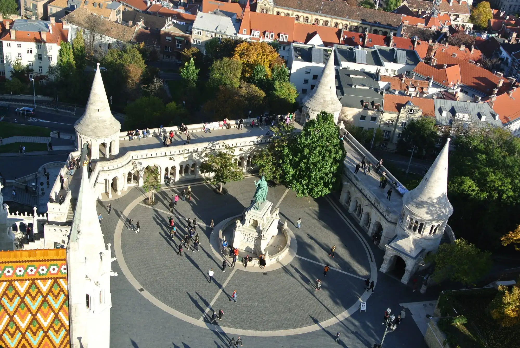 Fisherman's Bastion, the St Stephen statue and the edge of the Zsolnay-tiled roof seen from the tower of Matthias Church