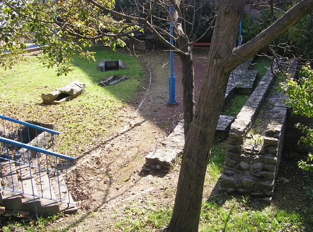 Low Roman walls and a late Roman stone casket grave in the garden of the Hercules Villa site in Óbuda, Budapest
