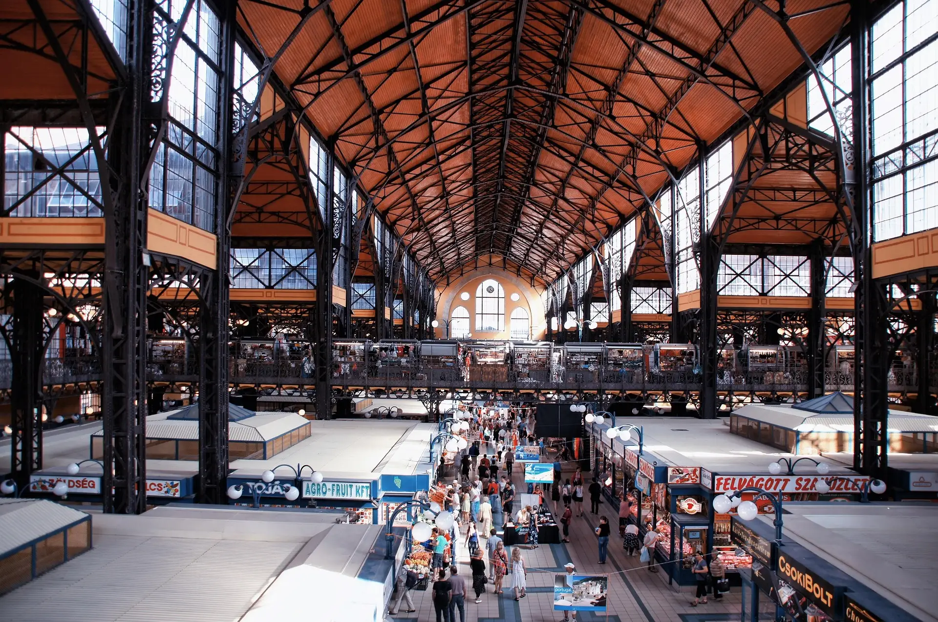 The Great Market Hall in Budapest from the gallery, looking down the main hall under its iron roof