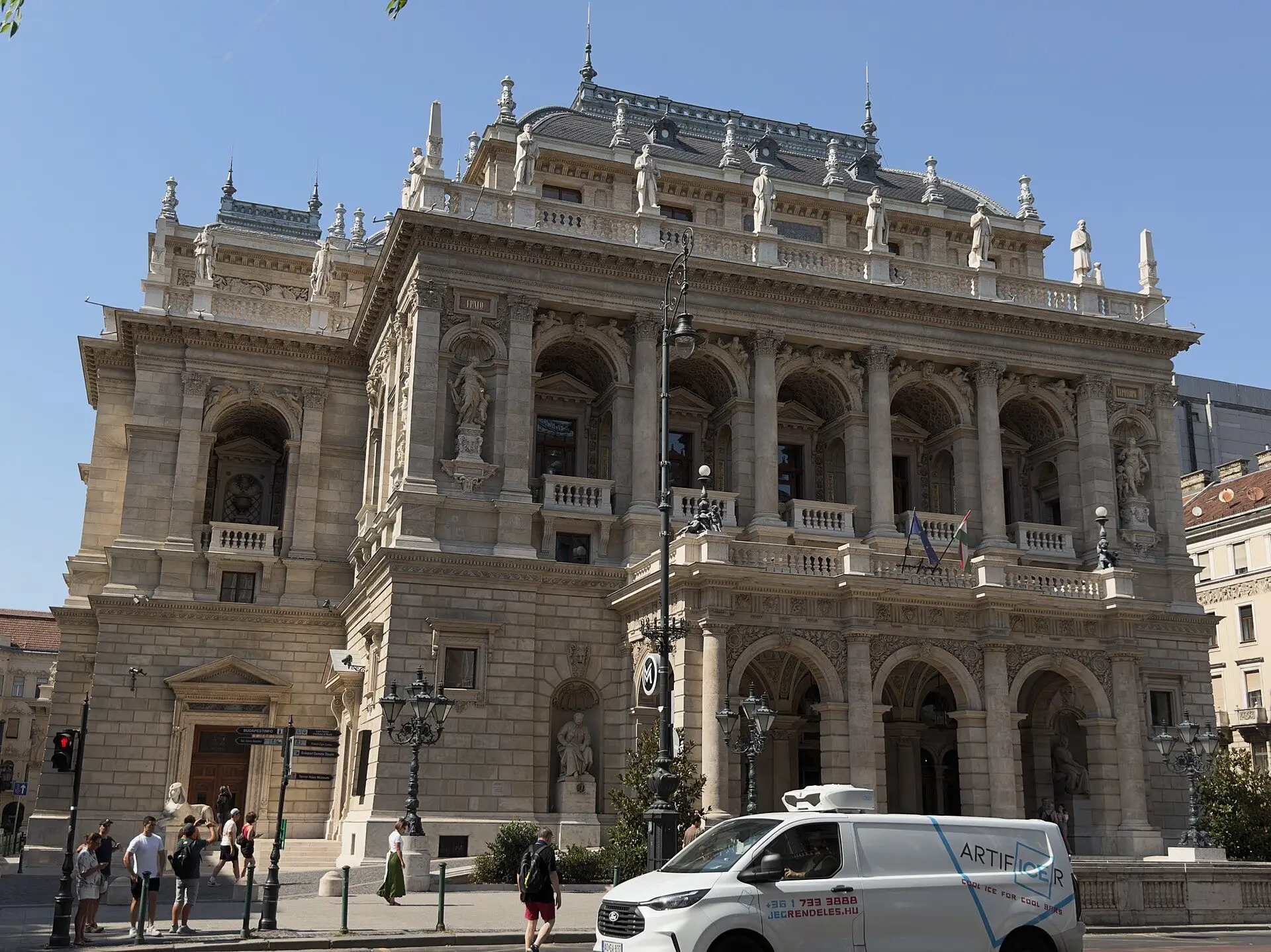 The Hungarian State Opera House on Andrássy út, its arcaded entrance and the row of composer statues along the parapet