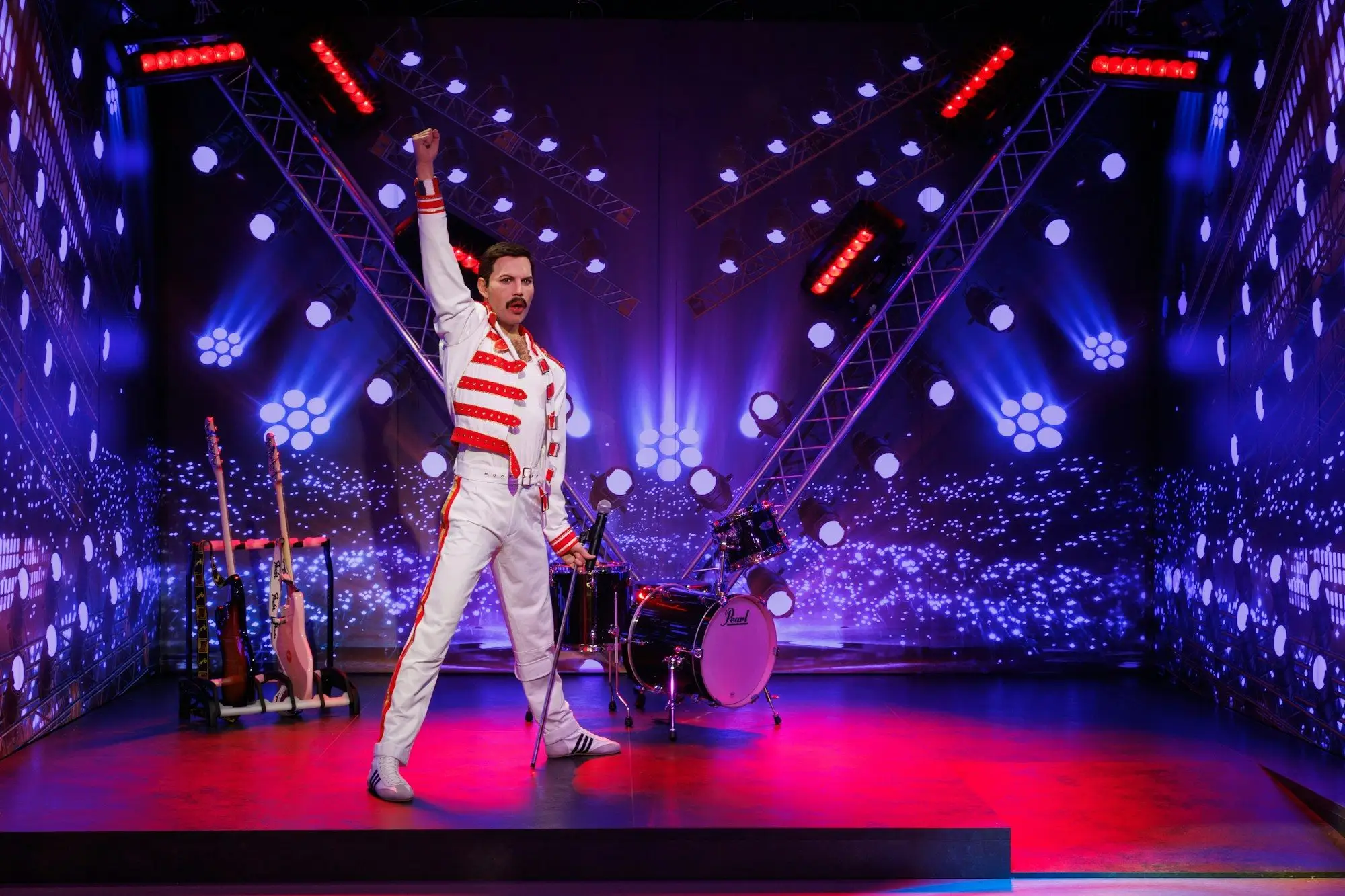 The Freddie Mercury wax figure on a stage set in the Music zone of Madame Tussauds Budapest