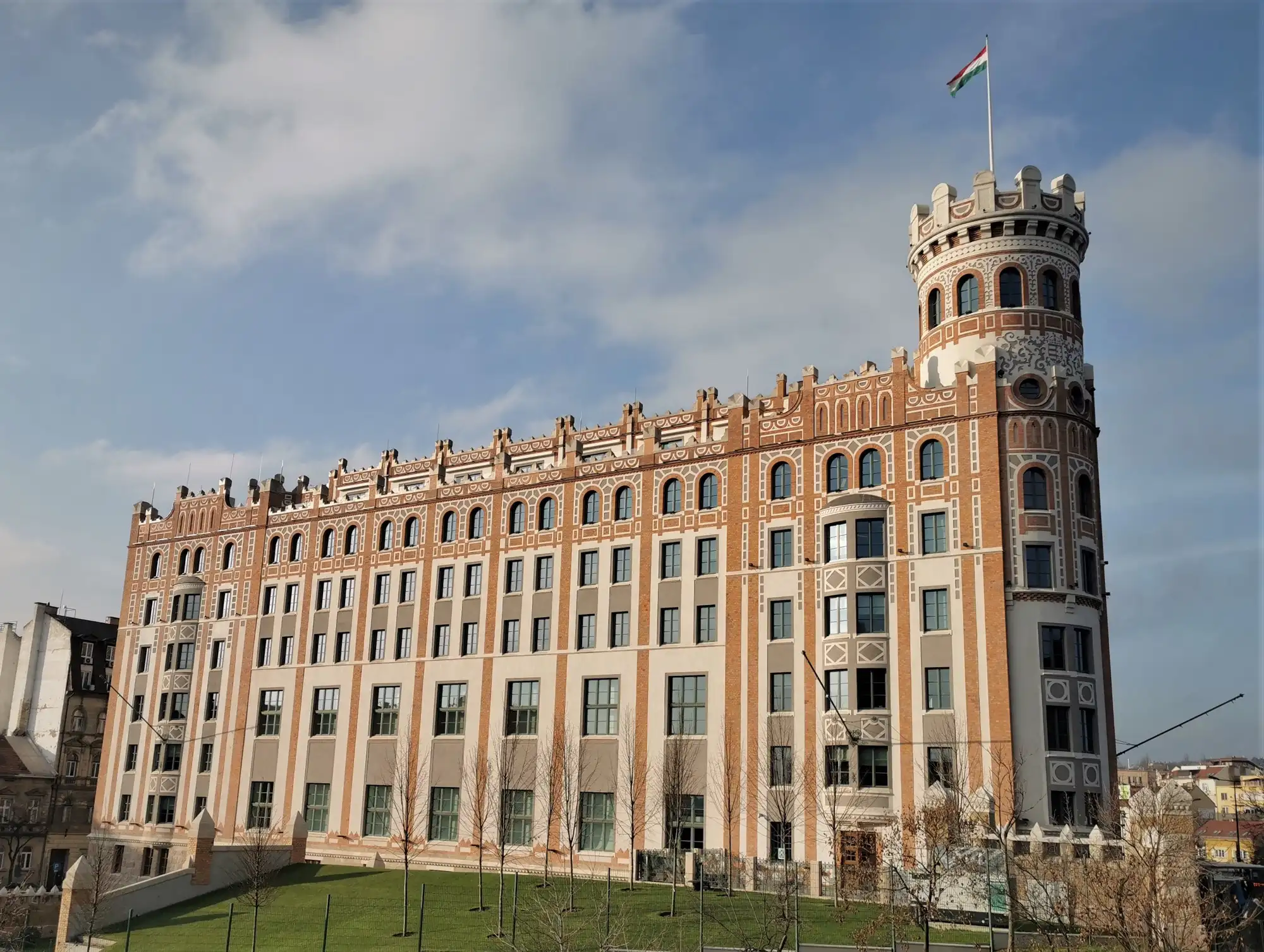 The restored red-brick Postal Palace on Krisztina körút in Budapest, with its corner tower, home of the Money Museum