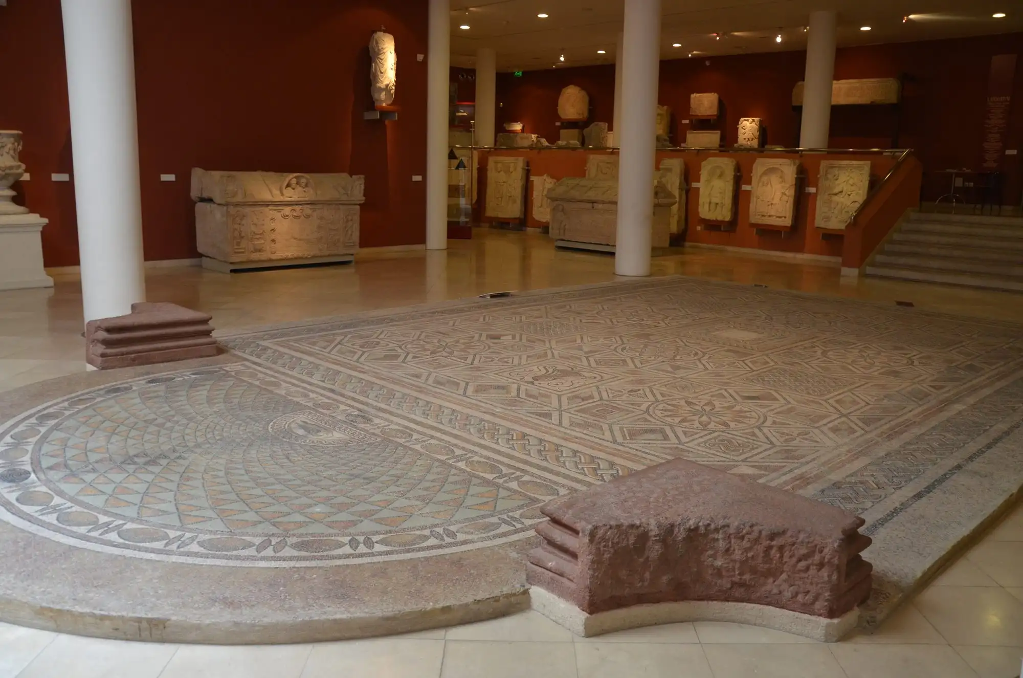 Roman sarcophagi, tombstones and a mosaic floor in the Lapidary beneath the courtyard of the Hungarian National Museum