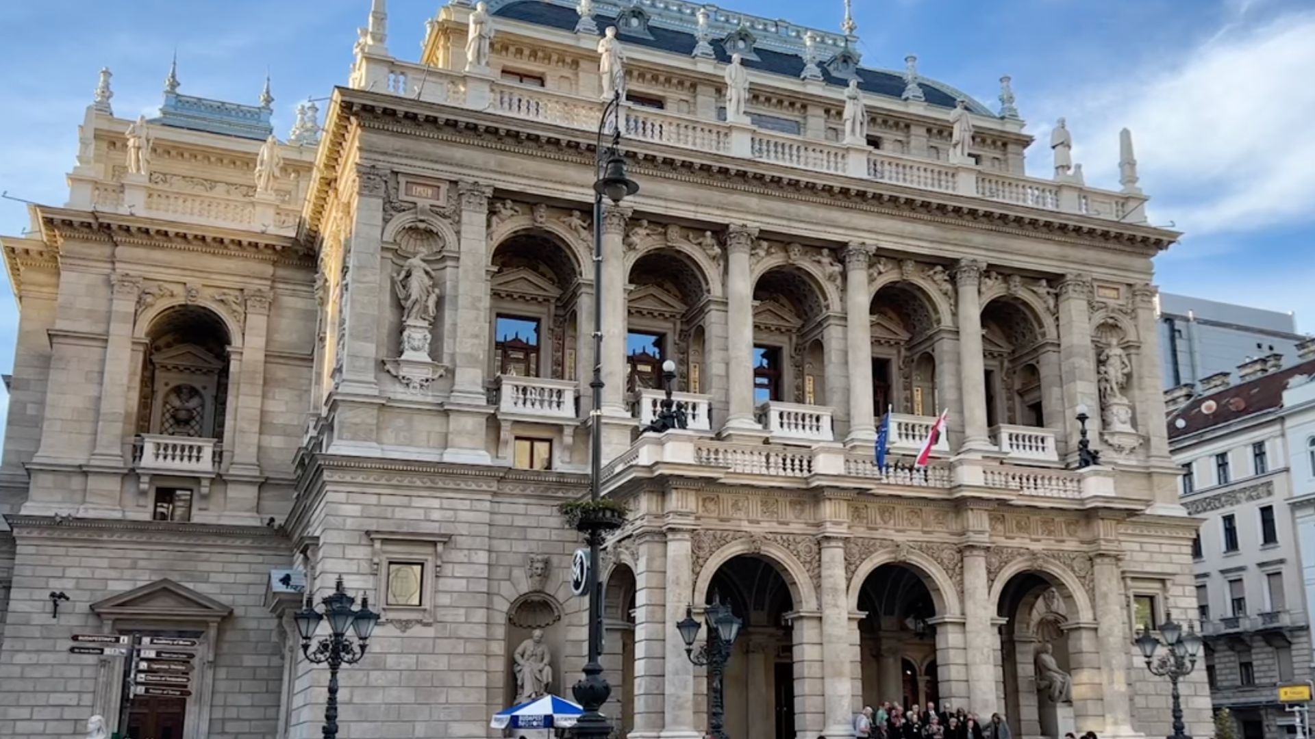 Front view of the Hungarian State Opera House on Andrássy Avenue in Budapest, Hungary, with its ornate architectural details.