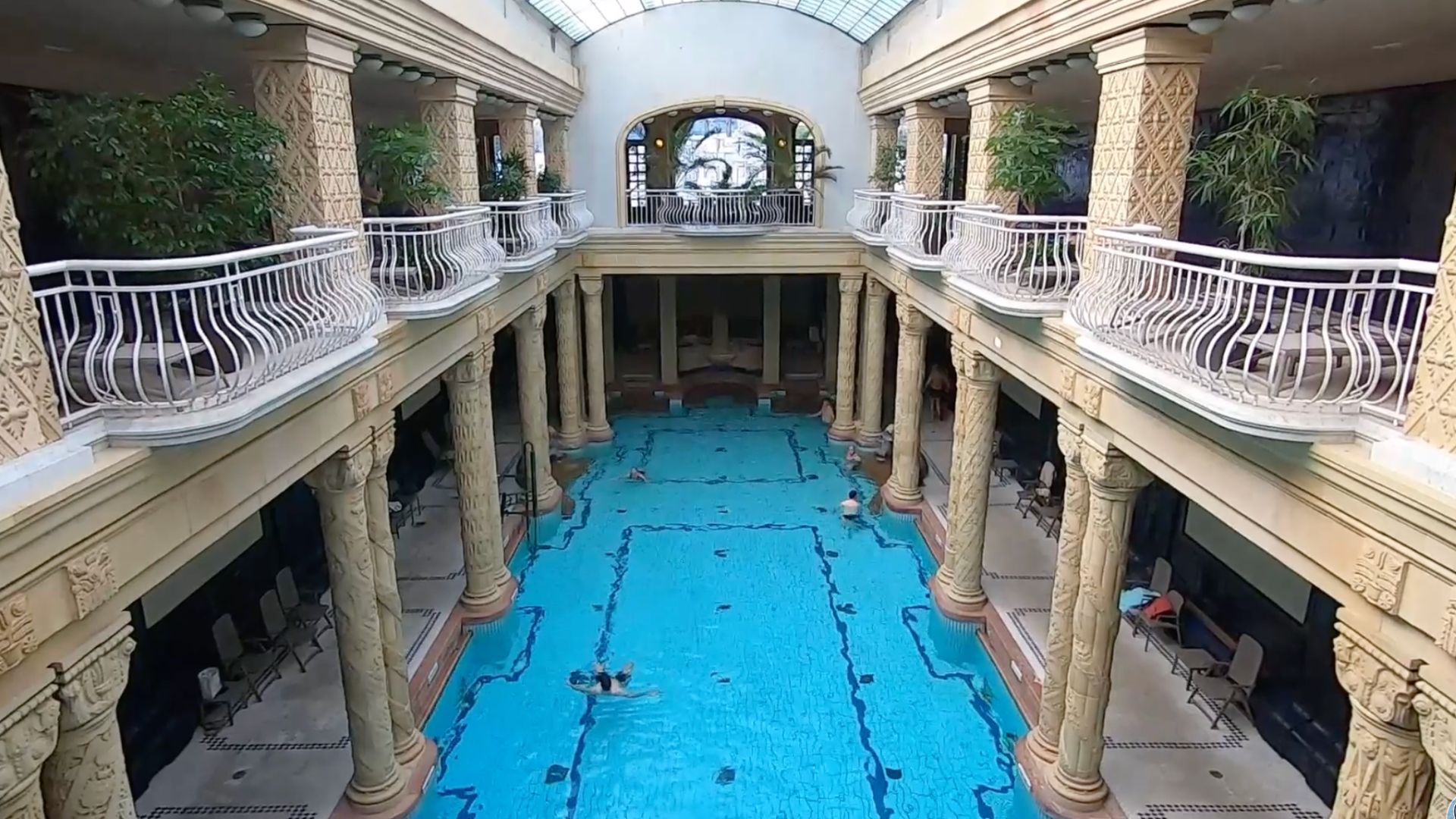 Indoor pool surrounded by intricate columns at Gellért Thermal Bath