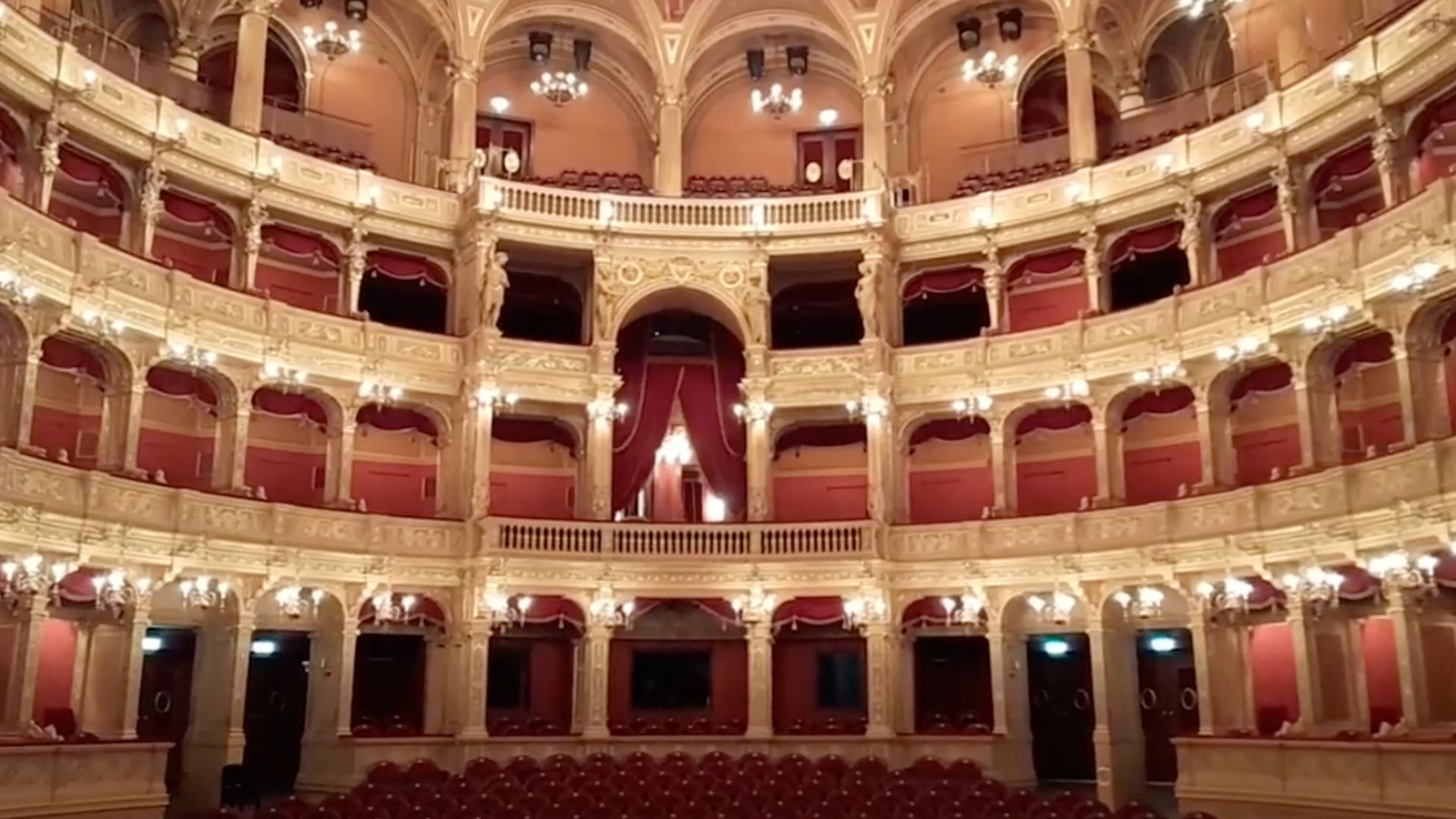 The auditorium of the Hungarian State Opera House in Budapest, Hungary, showing the ornate balconies and seating area.