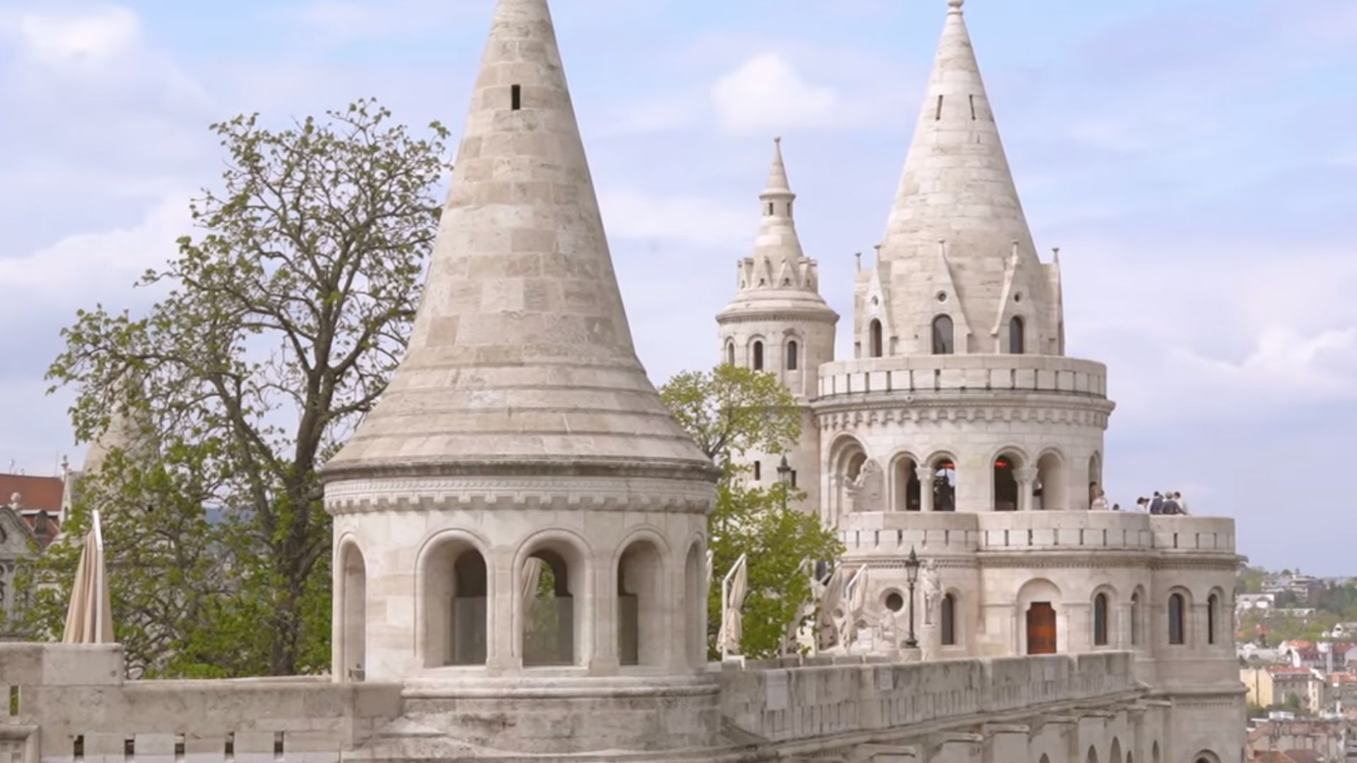 Turrets of Fisherman's Bastion with a clear sky in the background.